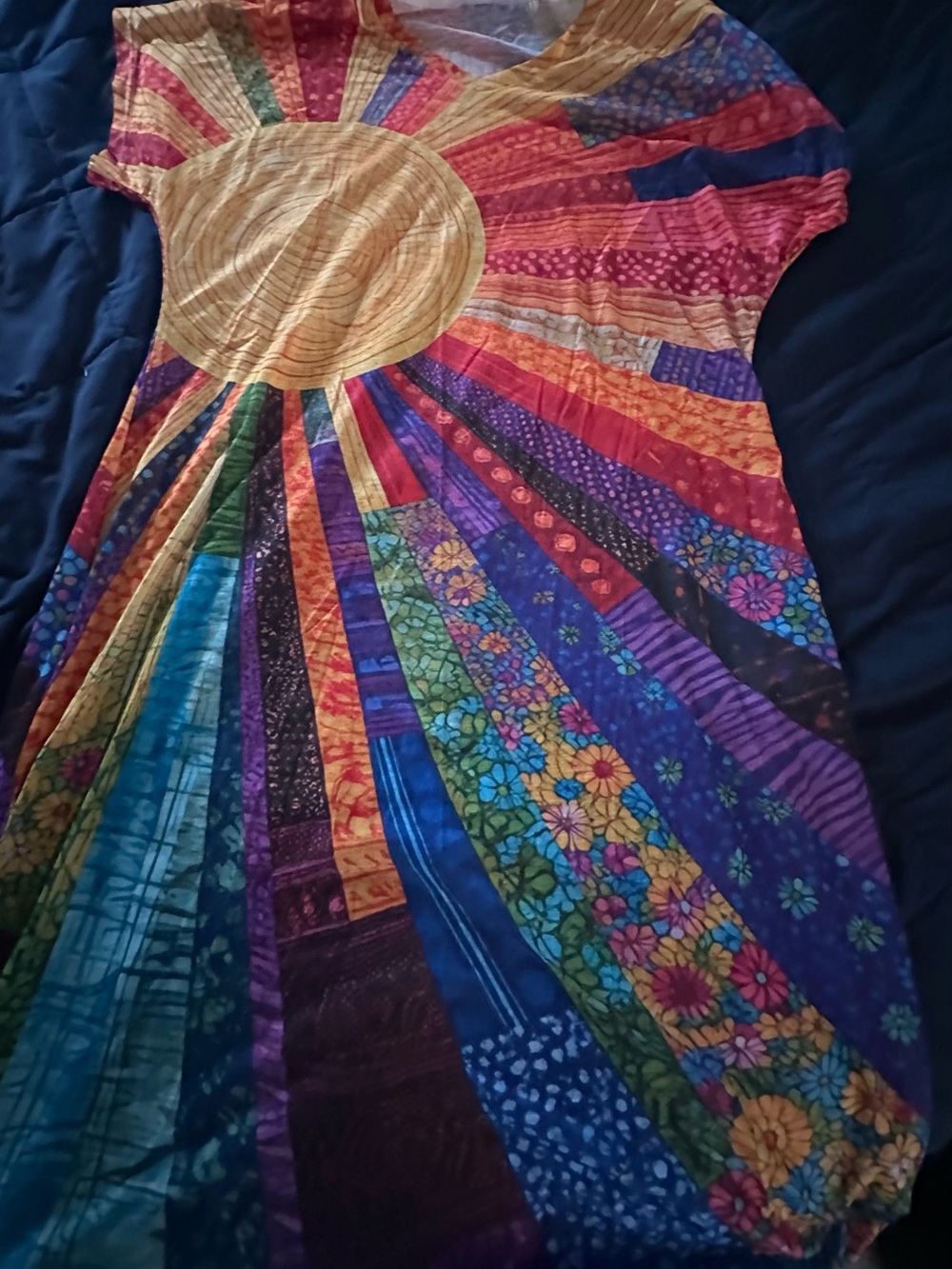 Lot of three dresses. Two Multicolor Sunburst Dresses and one mint dress